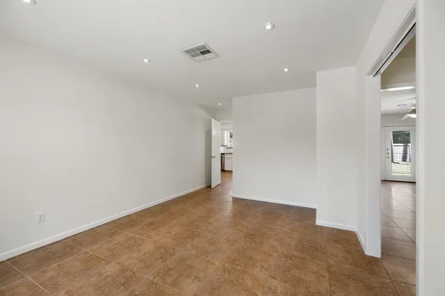 an empty room with a natural light