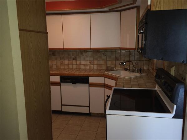 45 Gilson Road Groton, MA 01450 - Photo 2 of 9 a kitchen with a sink and a stove top oven