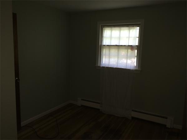45 Gilson Road Groton, MA 01450 - Photo 7 of 9 a view of an empty room with a window