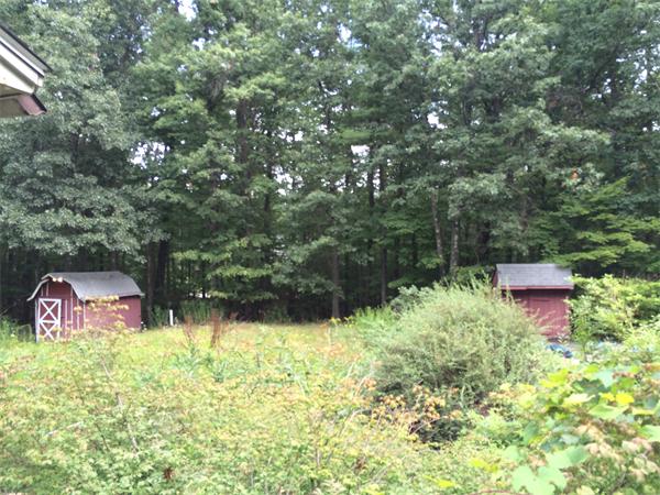 45 Gilson Road Groton, MA 01450 - Photo 9 of 9 a view of a back yard with an outdoor space