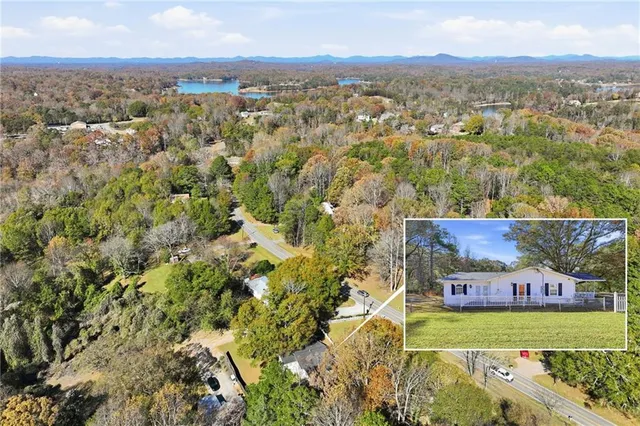an aerial view of a house with a garden