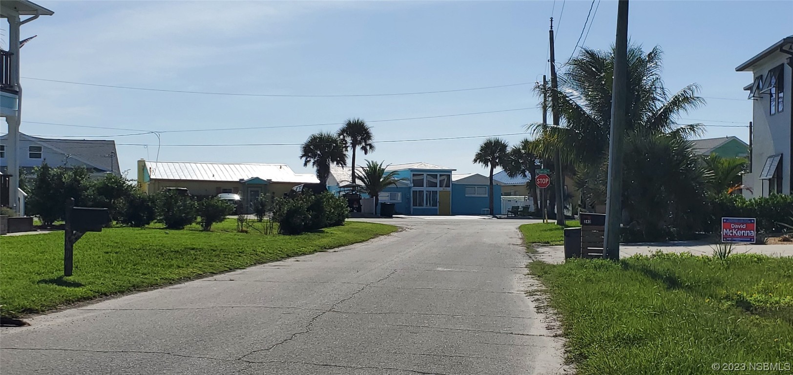 239 Kirkland Road New Smyrna Beach, FL 32169 - Photo 21 of 36 a front view of a house with a yard and pathway