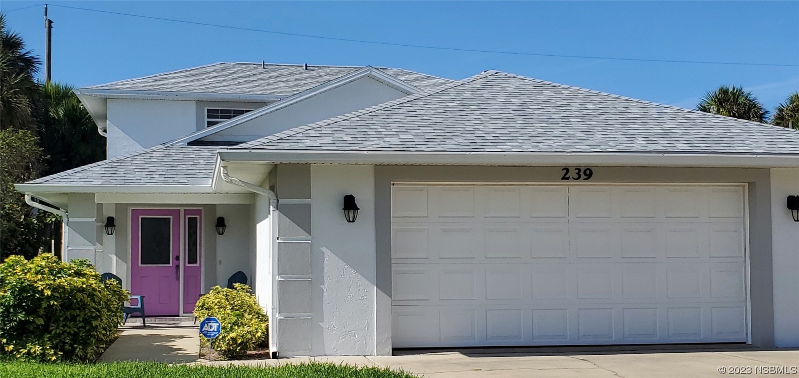 239 Kirkland Road New Smyrna Beach, FL 32169 - Photo 22 of 36 a front view of a house with a yard