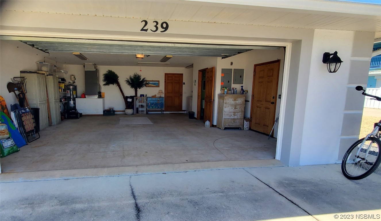 239 Kirkland Road New Smyrna Beach, FL 32169 - Photo 36 of 36 a view of a garage