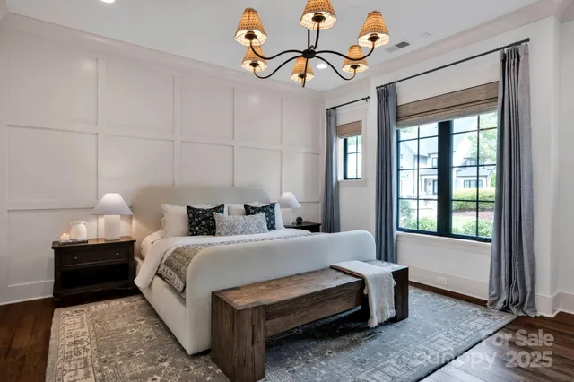 a bedroom with bed and a window