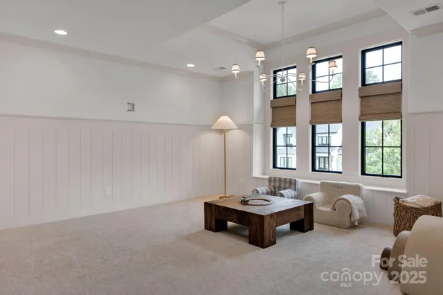 a bathroom with a double vanity sink and a bathtub