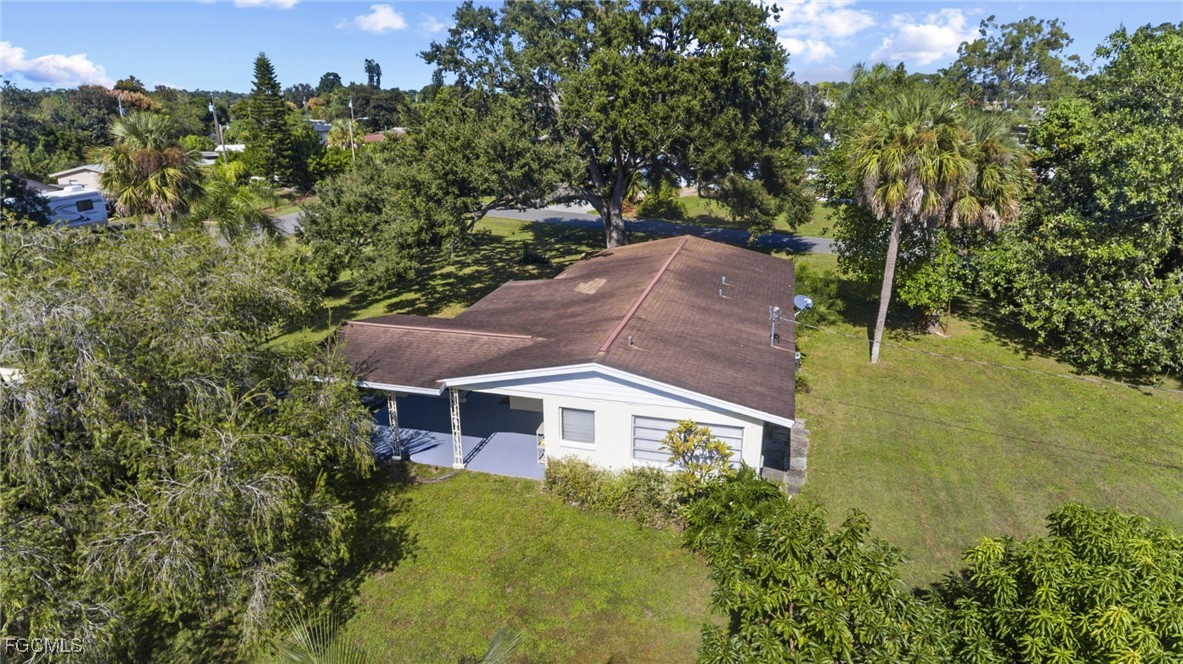 112 Clayton Avenue Lehigh Acres, FL 33936 - Photo 17 of 21 an aerial view of a house
