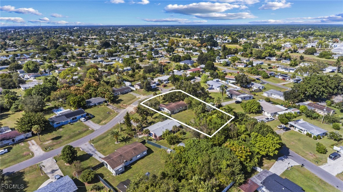 112 Clayton Avenue Lehigh Acres, FL 33936 - Photo 20 of 21 an aerial view of multiple house