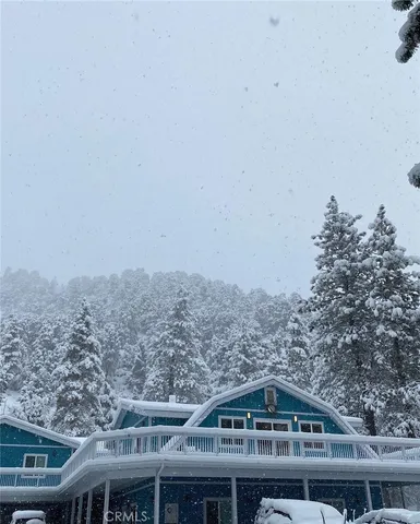 a kitchen with a sink and a clock on the wall