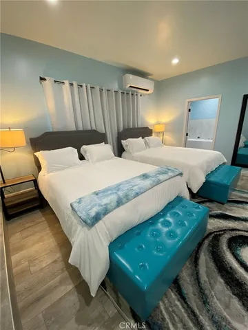 a bathroom with a bathtub and shower