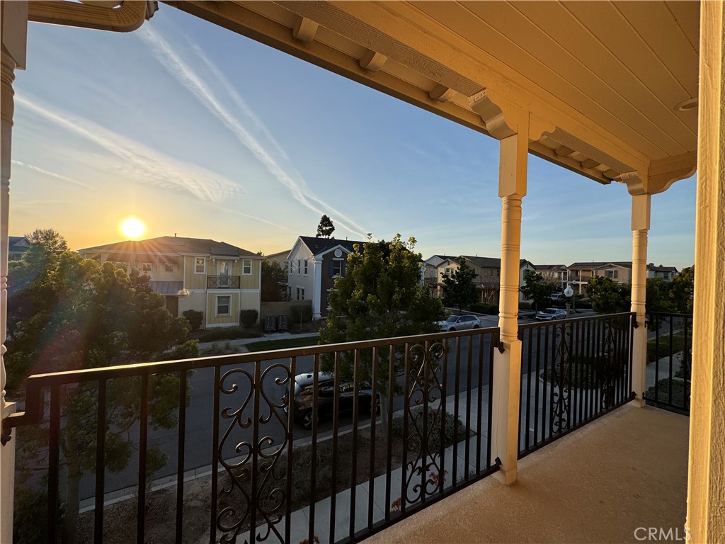 a view of a balcony with city view