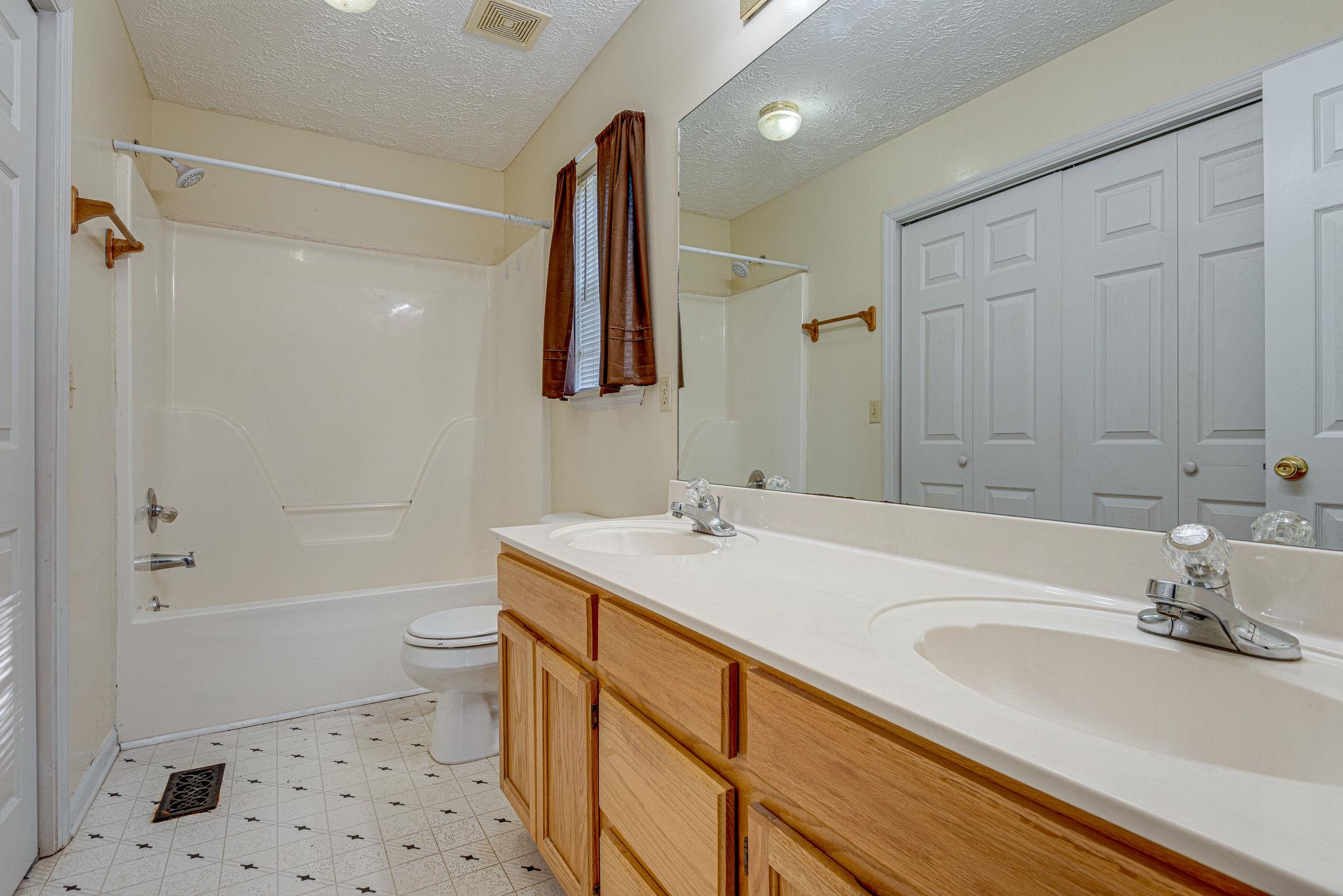 315 Preacher Road Charlotte, TN 37036 - Photo 15 of 26 Double Vanities in the Master Bath.