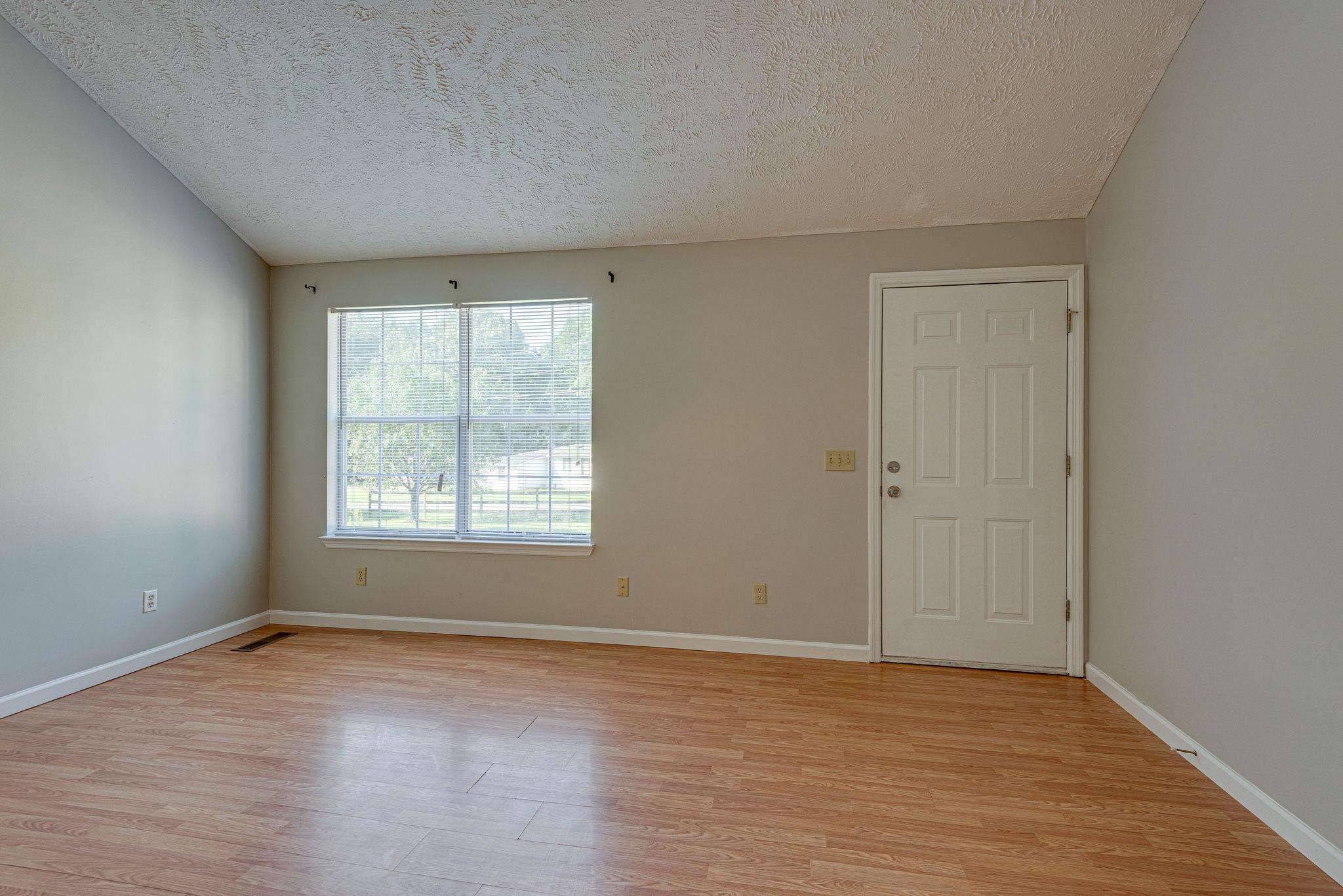 315 Preacher Road Charlotte, TN 37036 - Photo 5 of 26 Lots of Natural Light in the living room.