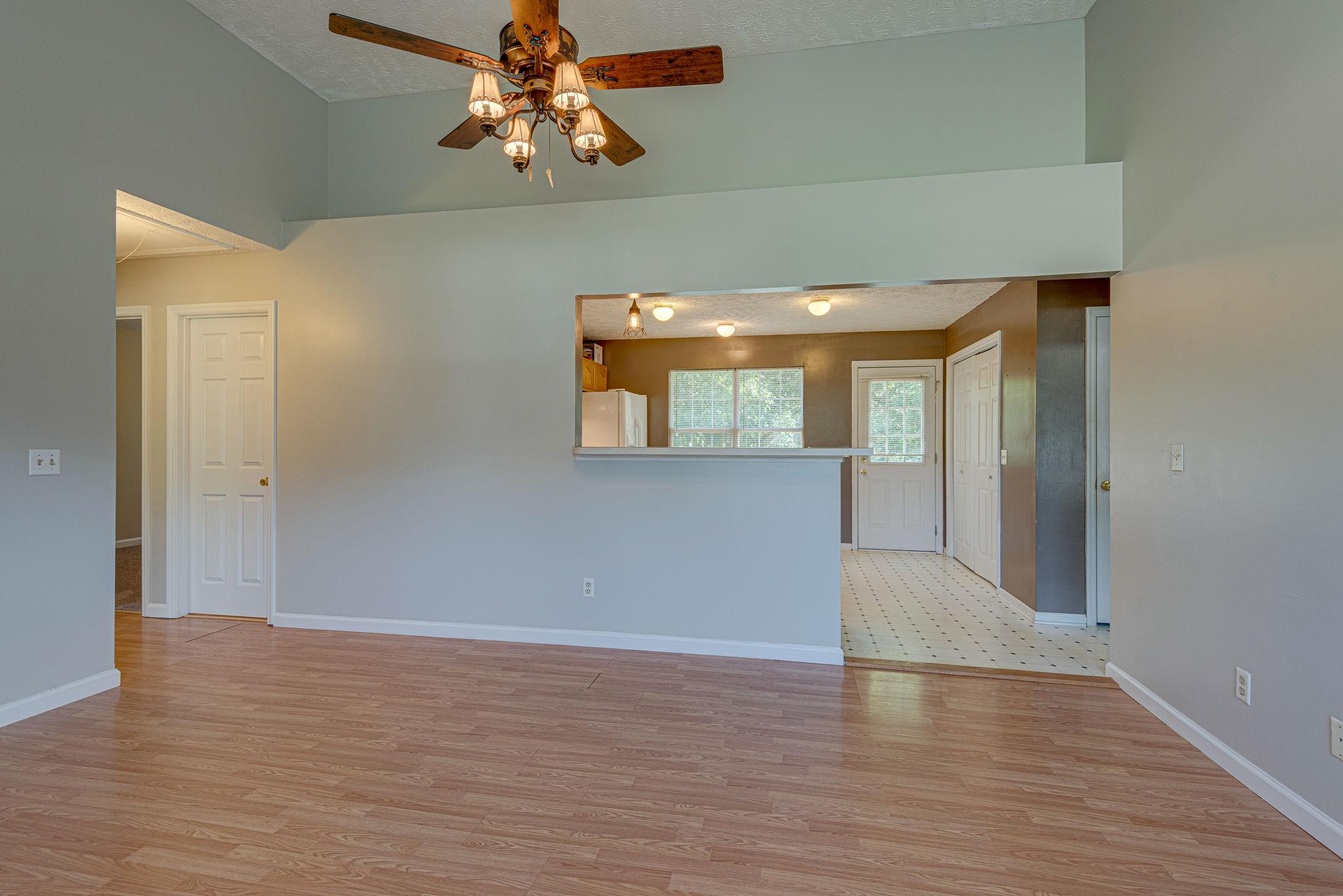 315 Preacher Road Charlotte, TN 37036 - Photo 7 of 26 Open Concept from Kitchen to Living Room.
