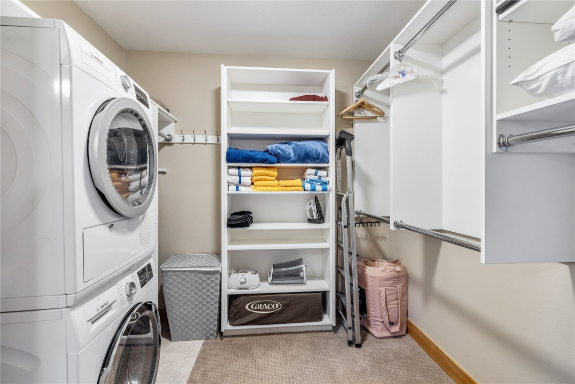 180 Tennis Club Road, Unit 1636 Keystone, CO 80435 - Photo 17 of 34 Laundry area featuring stacked washer / drying machine