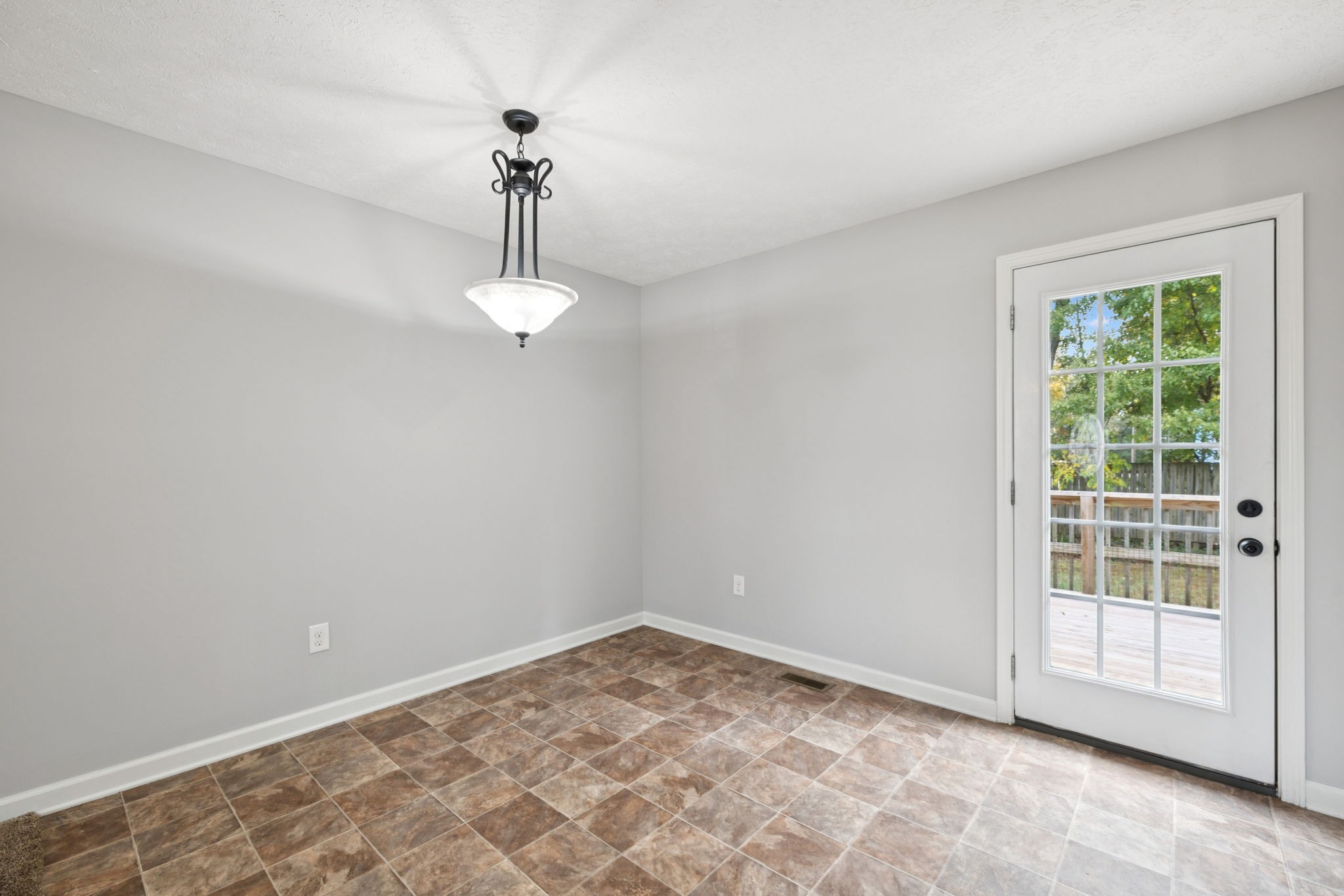 538 Indian Springs Circle Manchester, TN 37355 - Photo 17 of 59 a view of empty room with wooden floor and fan