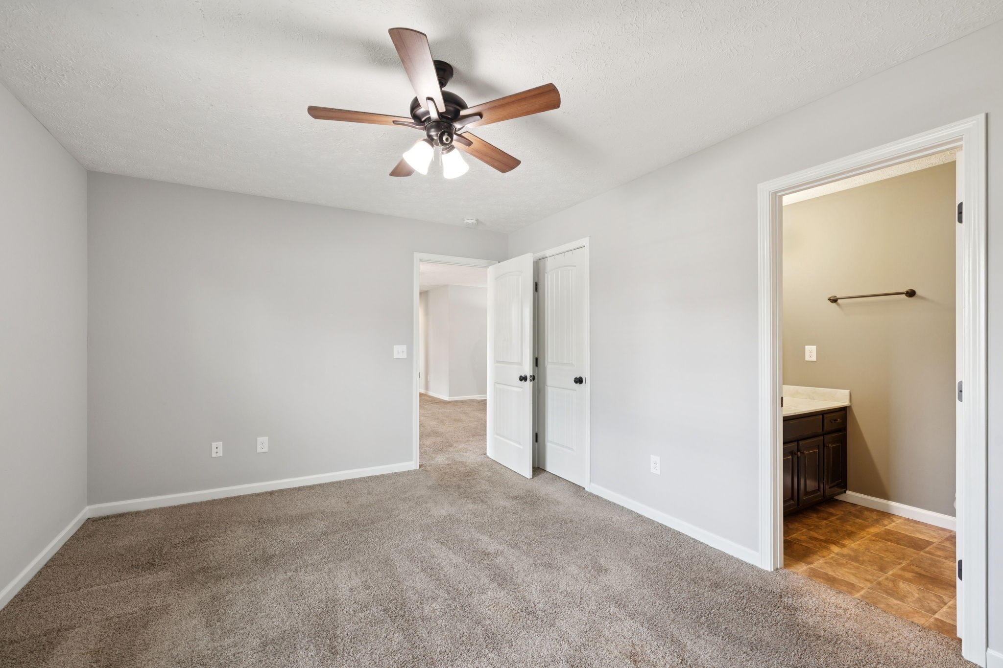 538 Indian Springs Circle Manchester, TN 37355 - Photo 20 of 59 a view of a room with a ceiling fan and closet area