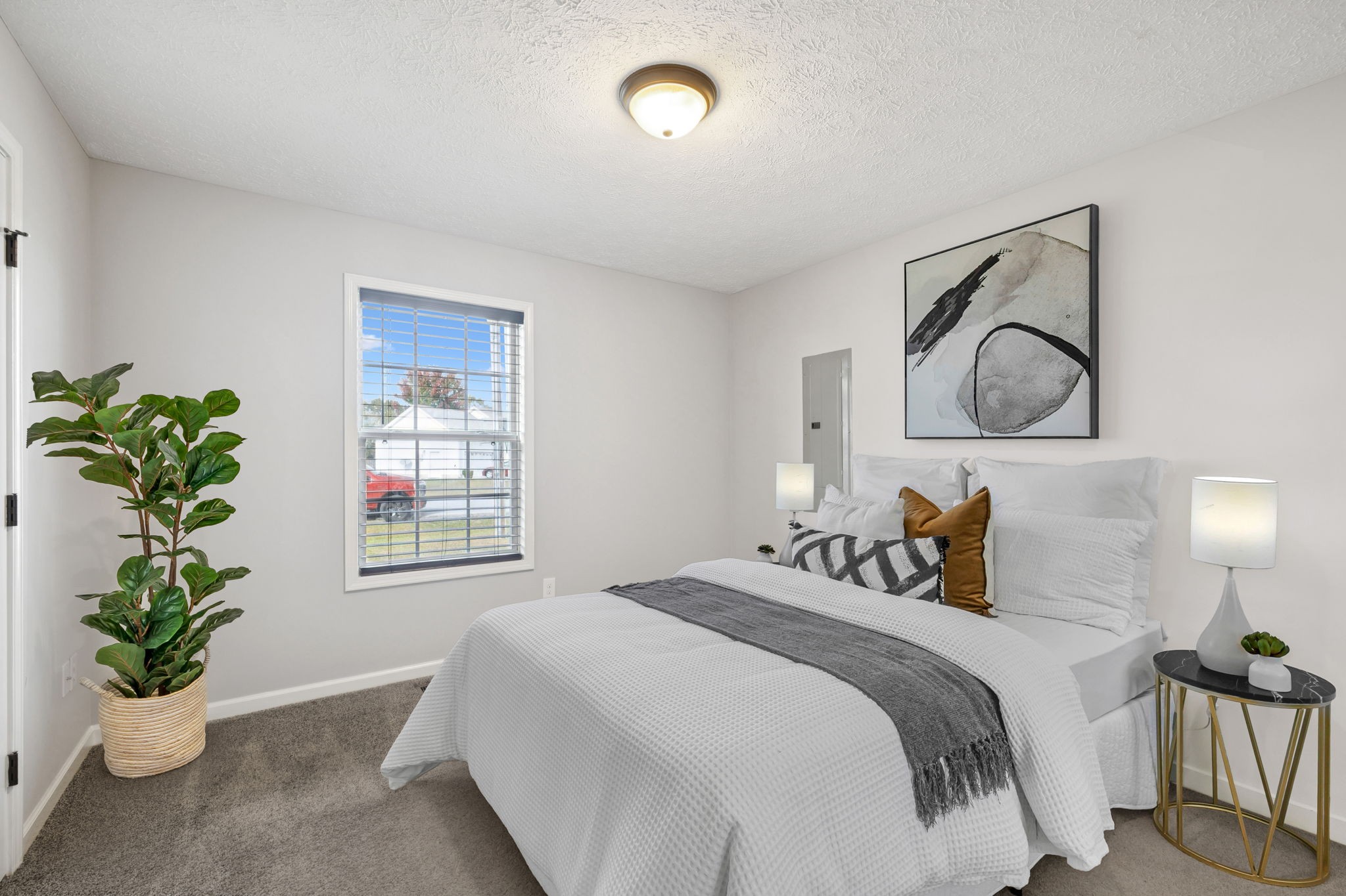 538 Indian Springs Circle Manchester, TN 37355 - Photo 26 of 59 a bedroom with a bed and a potted plant