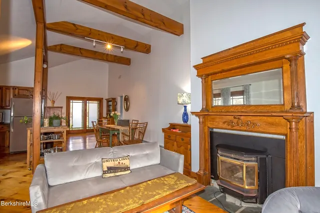 a kitchen with stainless steel appliances a refrigerator and a stove top oven