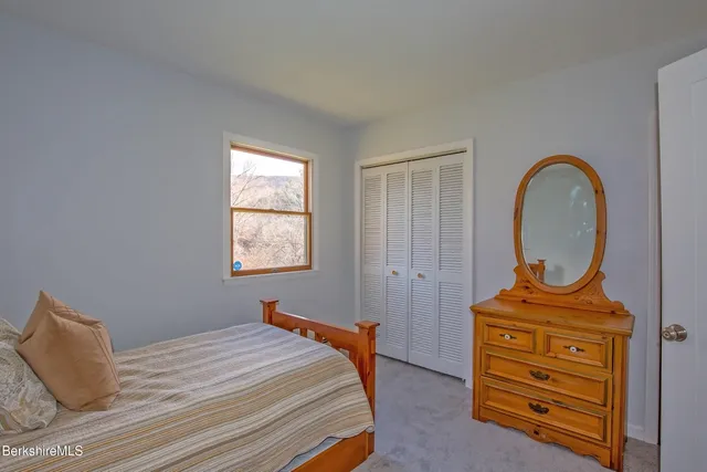a living room with a couch and a fireplace
