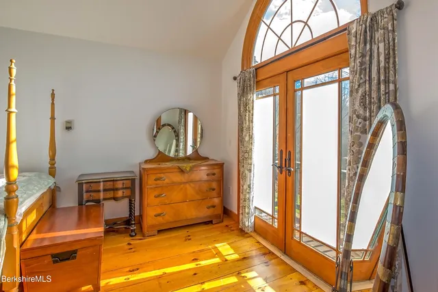a bathroom with a toilet and shower