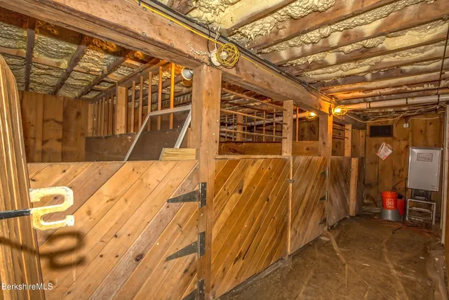 a view of a porch with wooden floor and electric walls