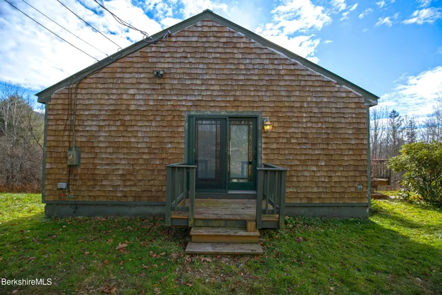 an aerial view of residential house with outdoor space