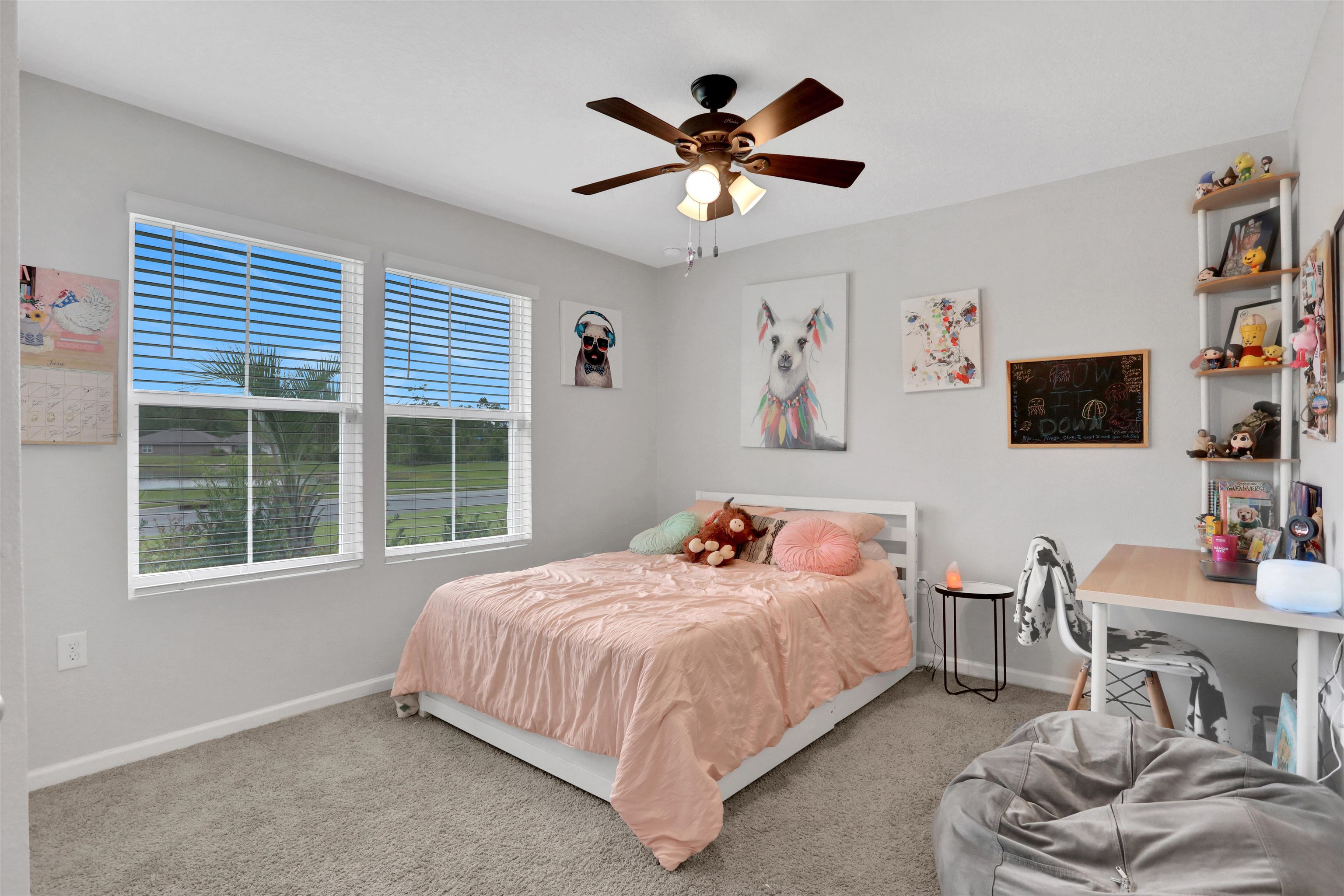 123 Hickory Ridge Road St. Augustine, FL 32084 - Photo 13 of 26 a bedroom with a bed window and a flat screen tv