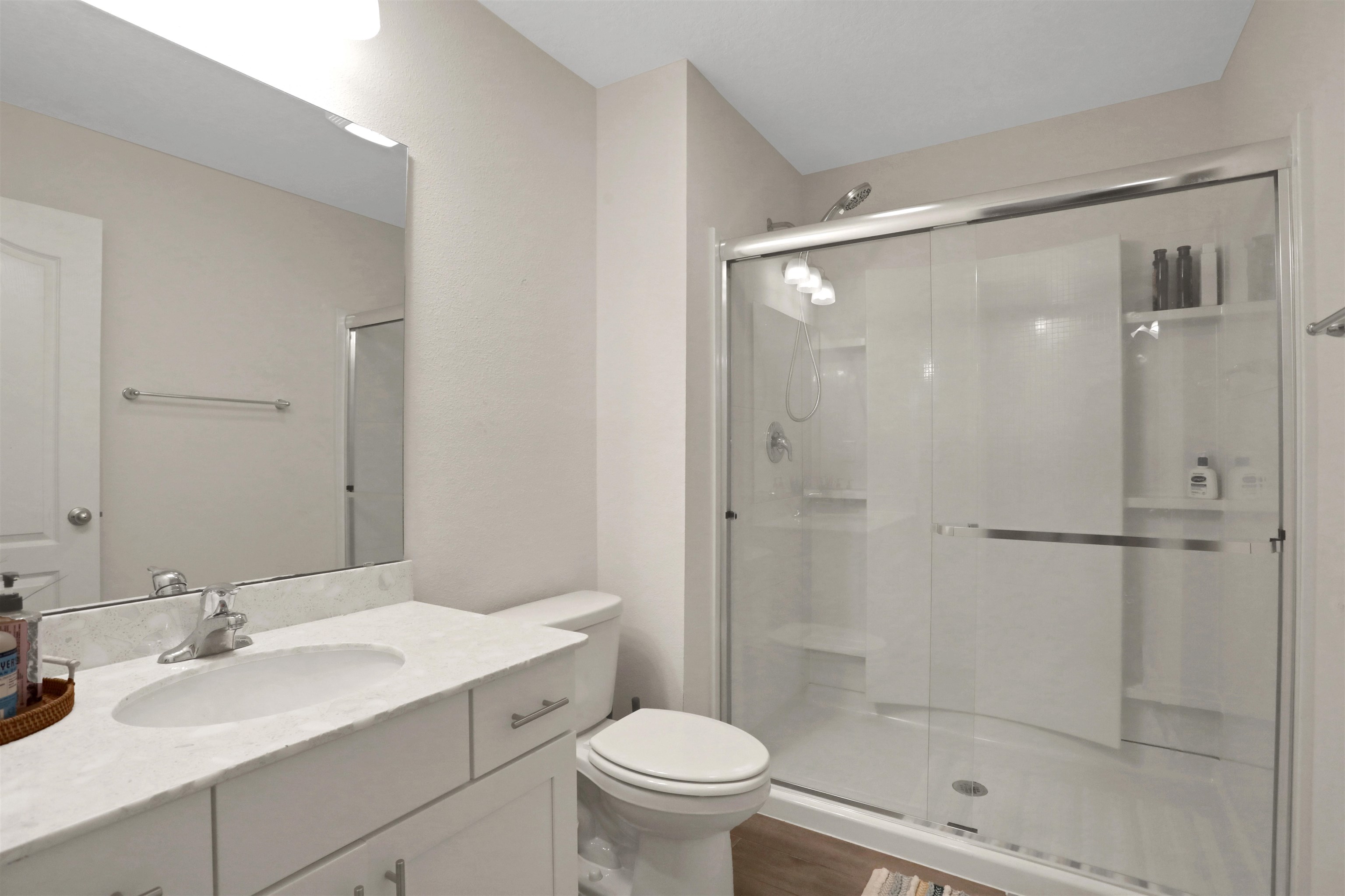 123 Hickory Ridge Road St. Augustine, FL 32084 - Photo 23 of 26 a bathroom with a sink toilet and shower