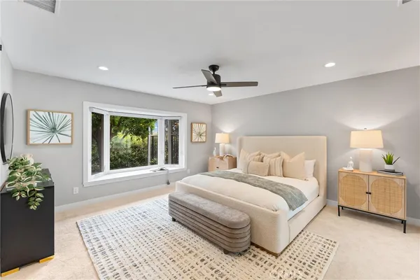 a bed room with a bed and dresser