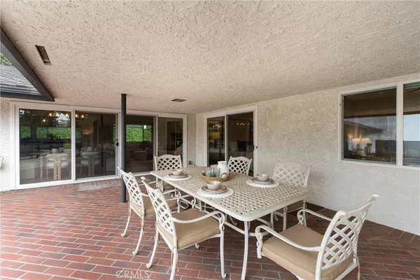 a view of a patio with furniture