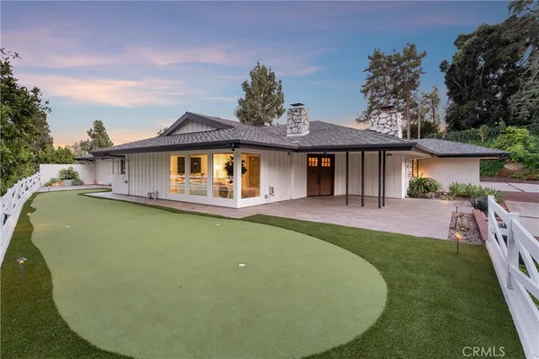 a view of an outdoor space and tennis court