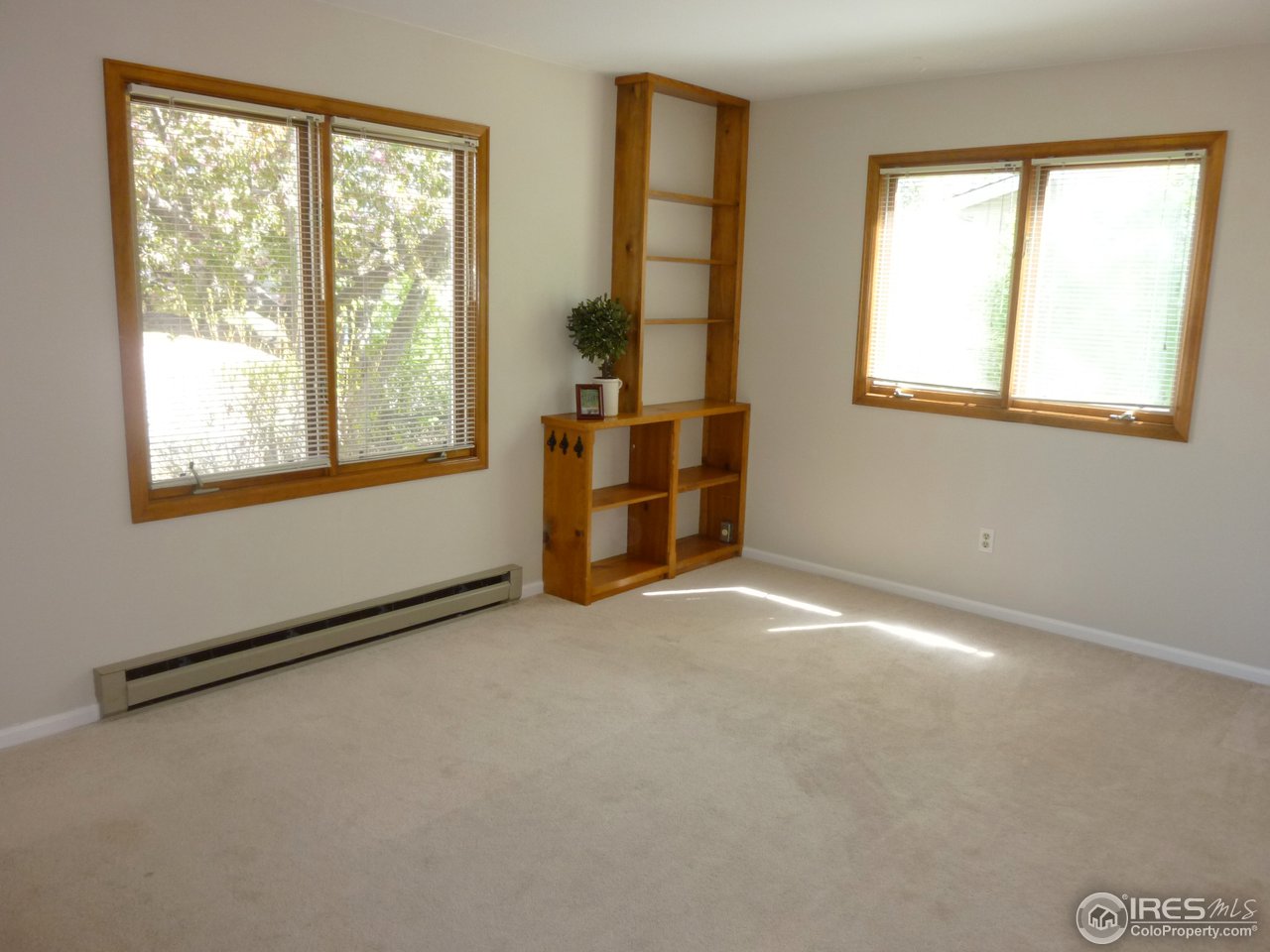 1305 Centennial Road Fort Collins, CO 80525 - Photo 18 of 25 Large second bedroom with built-ins