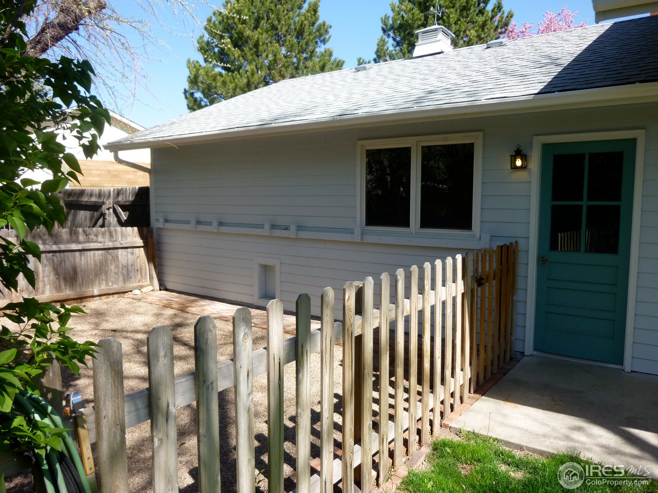 1305 Centennial Road Fort Collins, CO 80525 - Photo 24 of 25 Dog-run with dog-door into garage