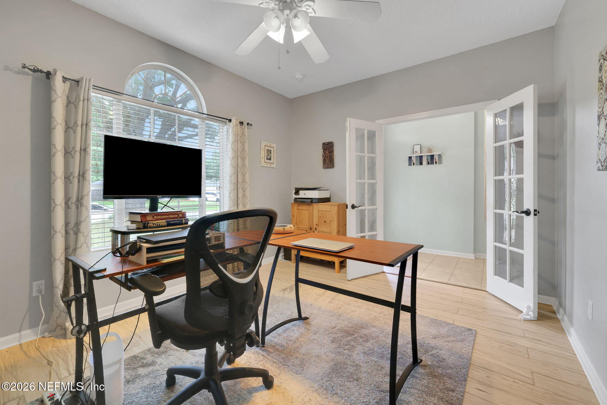 4320 Rye Court St. Johns, FL 32259 - Photo 11 of 60 a view of a livingroom with furniture and a flat screen tv