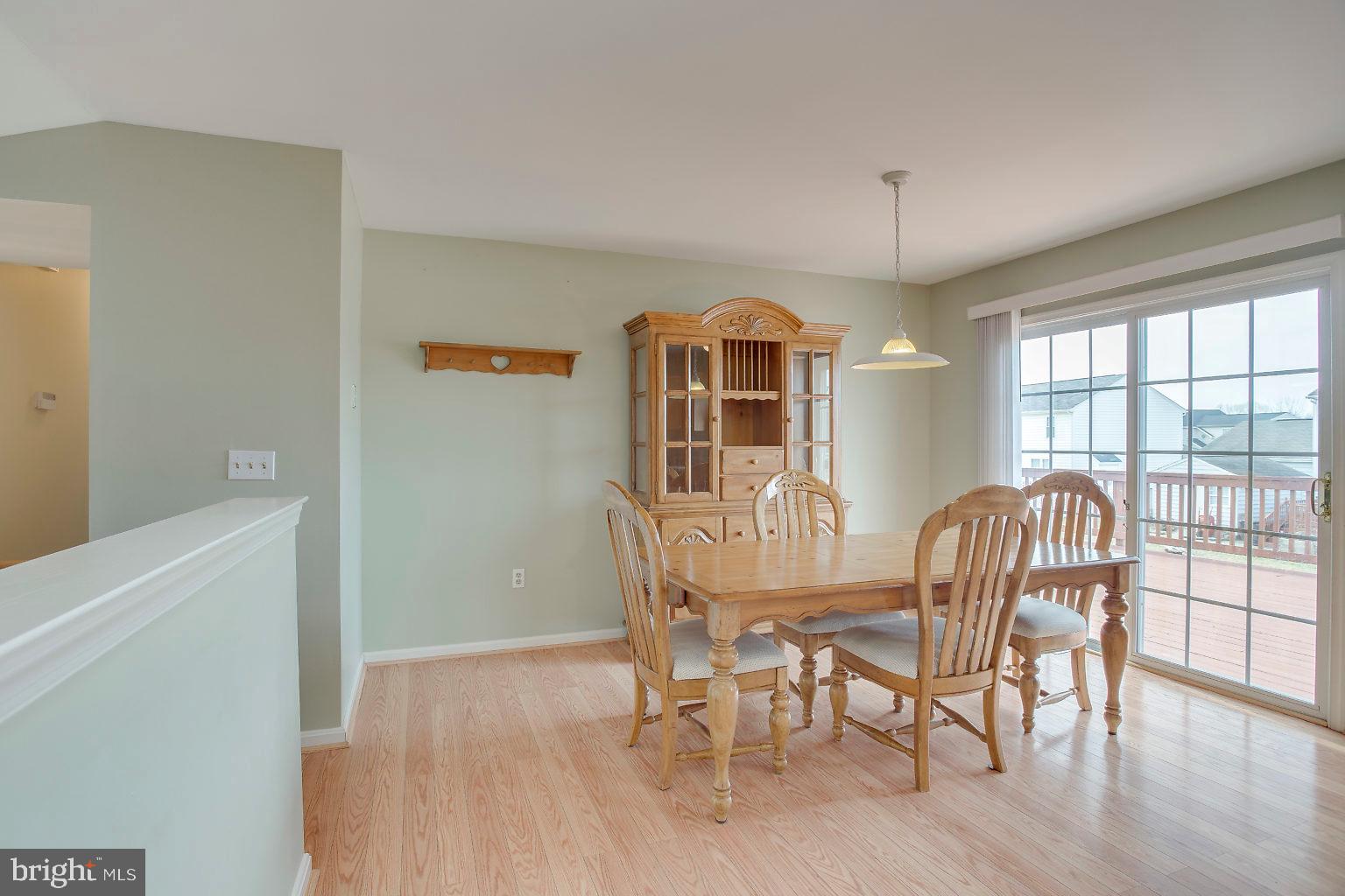 4502 Sandwood Road Baltimore, MD 21219 - Photo 16 of 39 Dining area with doors to deck
