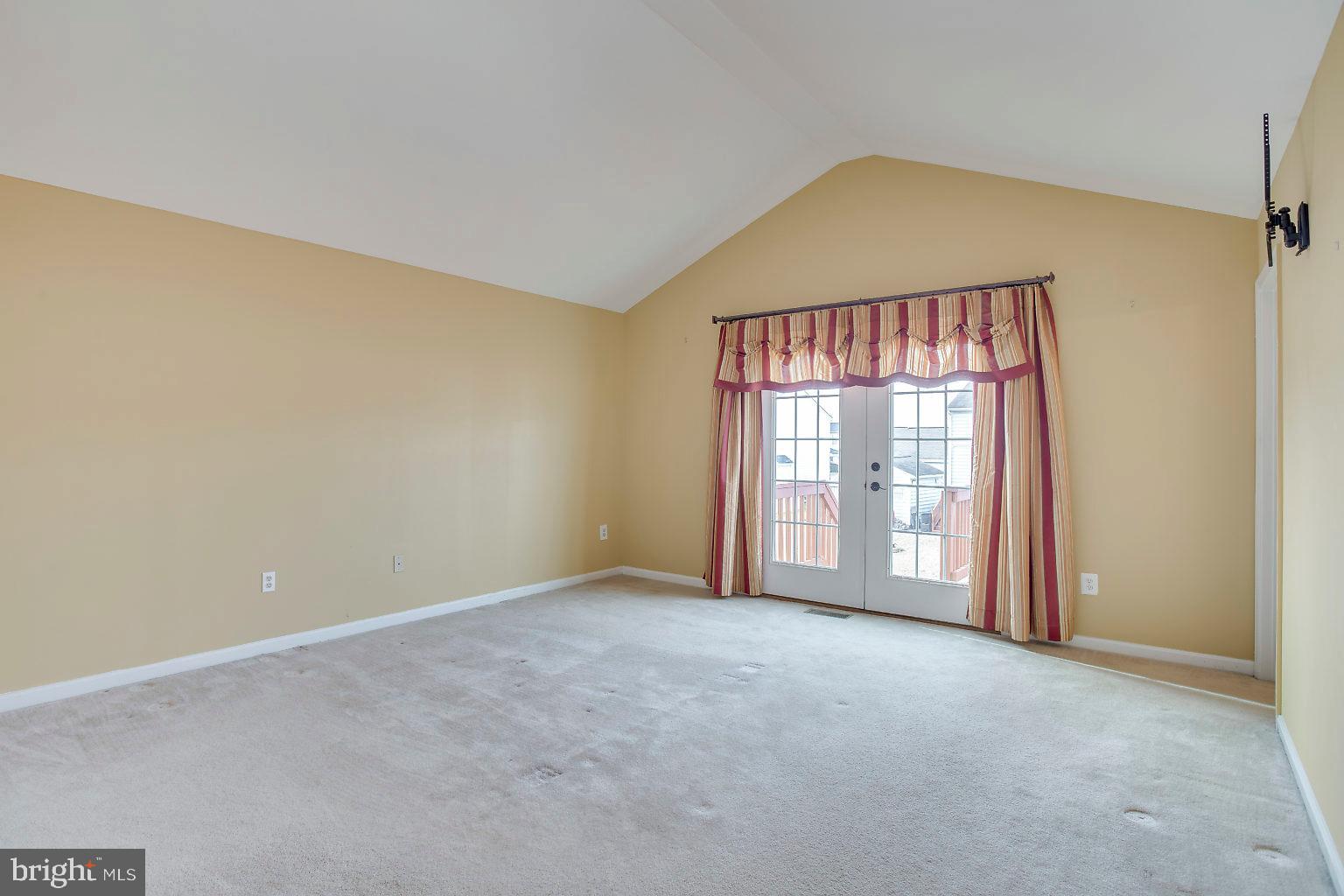 4502 Sandwood Road Baltimore, MD 21219 - Photo 23 of 39 Master Bedroom doors to deck