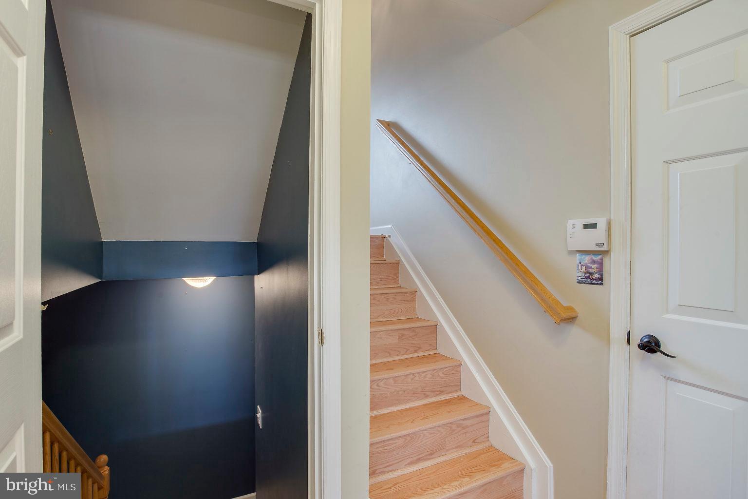 4502 Sandwood Road Baltimore, MD 21219 - Photo 31 of 39 stairs from foyer to garage and lower level 2