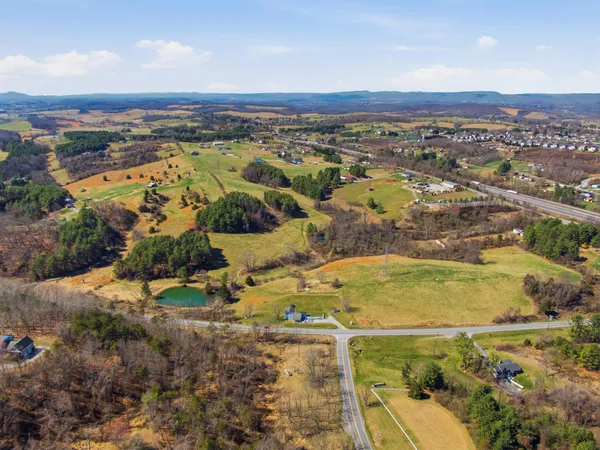an aerial view of residential house with outdoor space