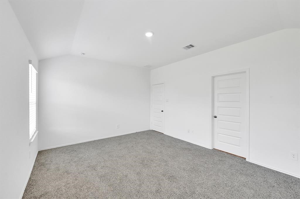 31006 Brightwell Bend Fulshear, TX 77441 - Photo 13 of 47 a view of an empty room