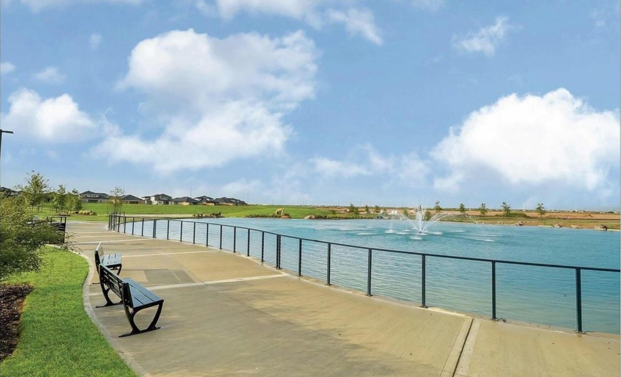 31006 Brightwell Bend Fulshear, TX 77441 - Photo 37 of 47 a view of a terrace with skyline