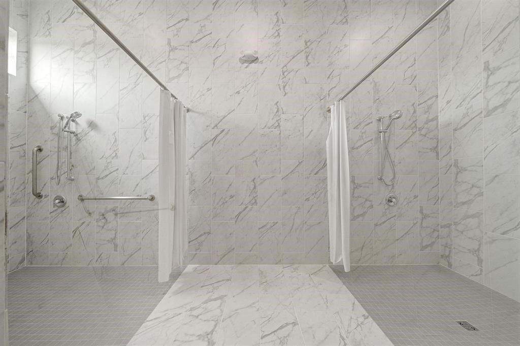 31006 Brightwell Bend Fulshear, TX 77441 - Photo 42 of 47 a bathroom with a shower