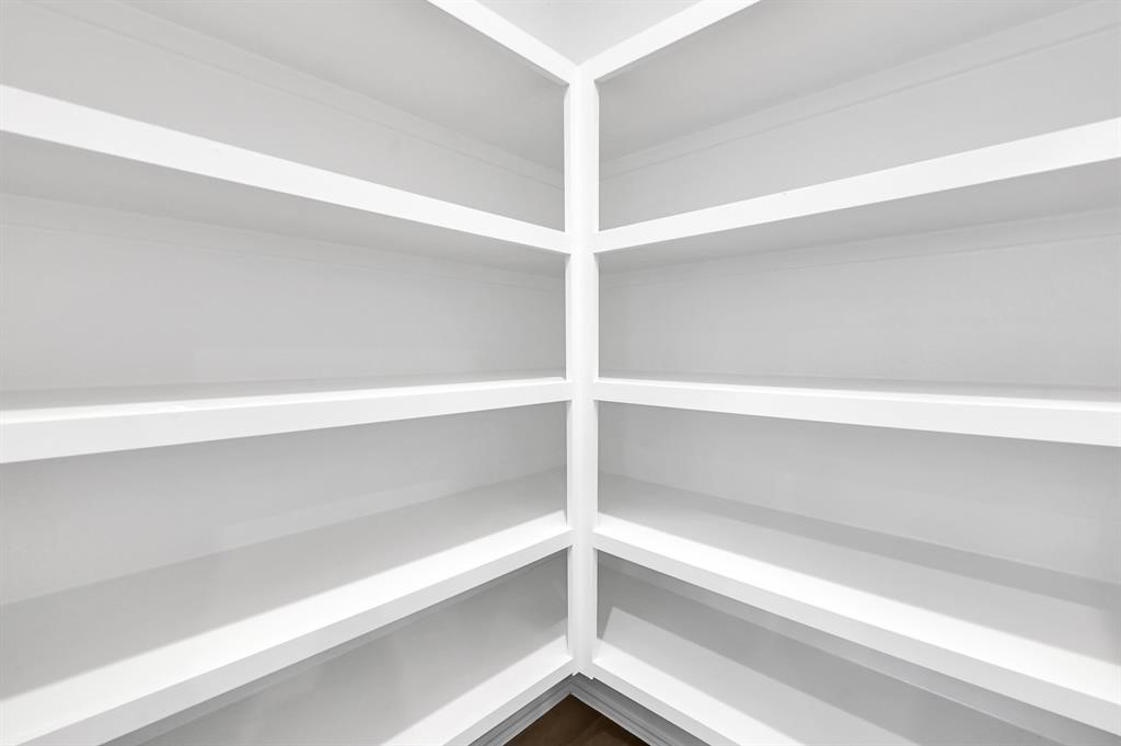 31006 Brightwell Bend Fulshear, TX 77441 - Photo 10 of 47 a view of an empty walk in closet