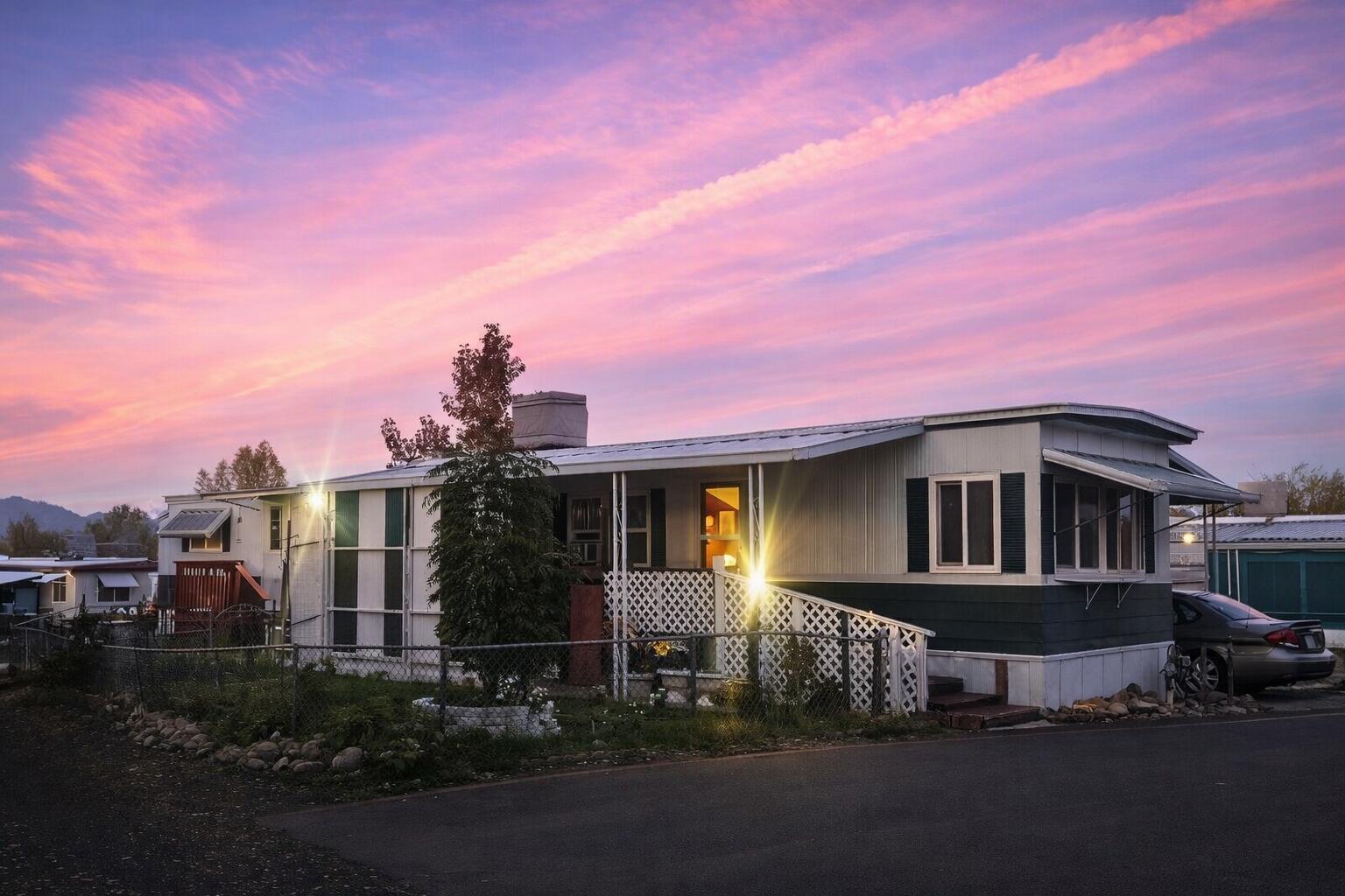 481 Twin View Boulevard, Unit 63 Redding, CA 96003 - Photo 1 of 19 a front view of a house with a yard