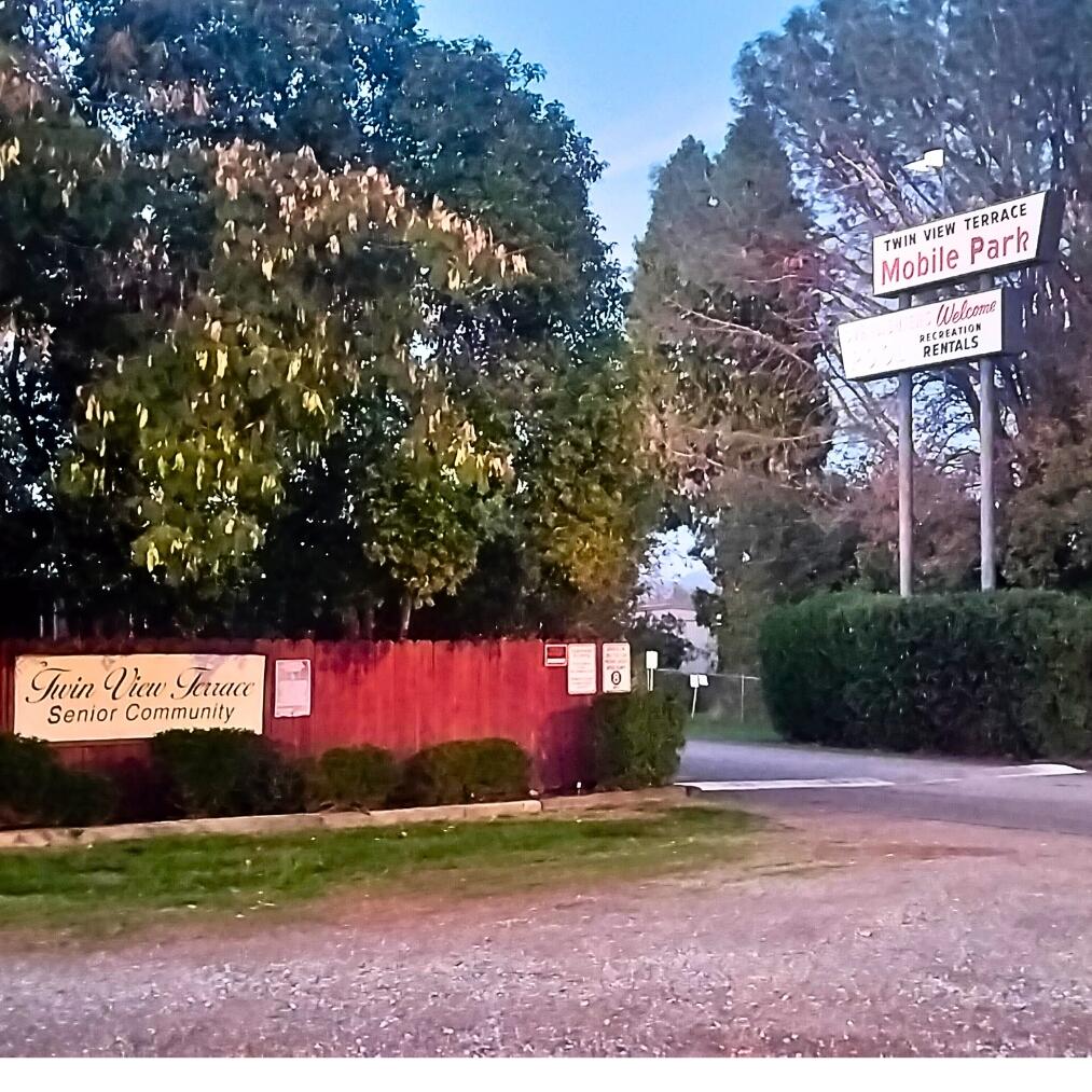 481 Twin View Boulevard, Unit 63 Redding, CA 96003 - Photo 20 of 20 a view of a park with large trees