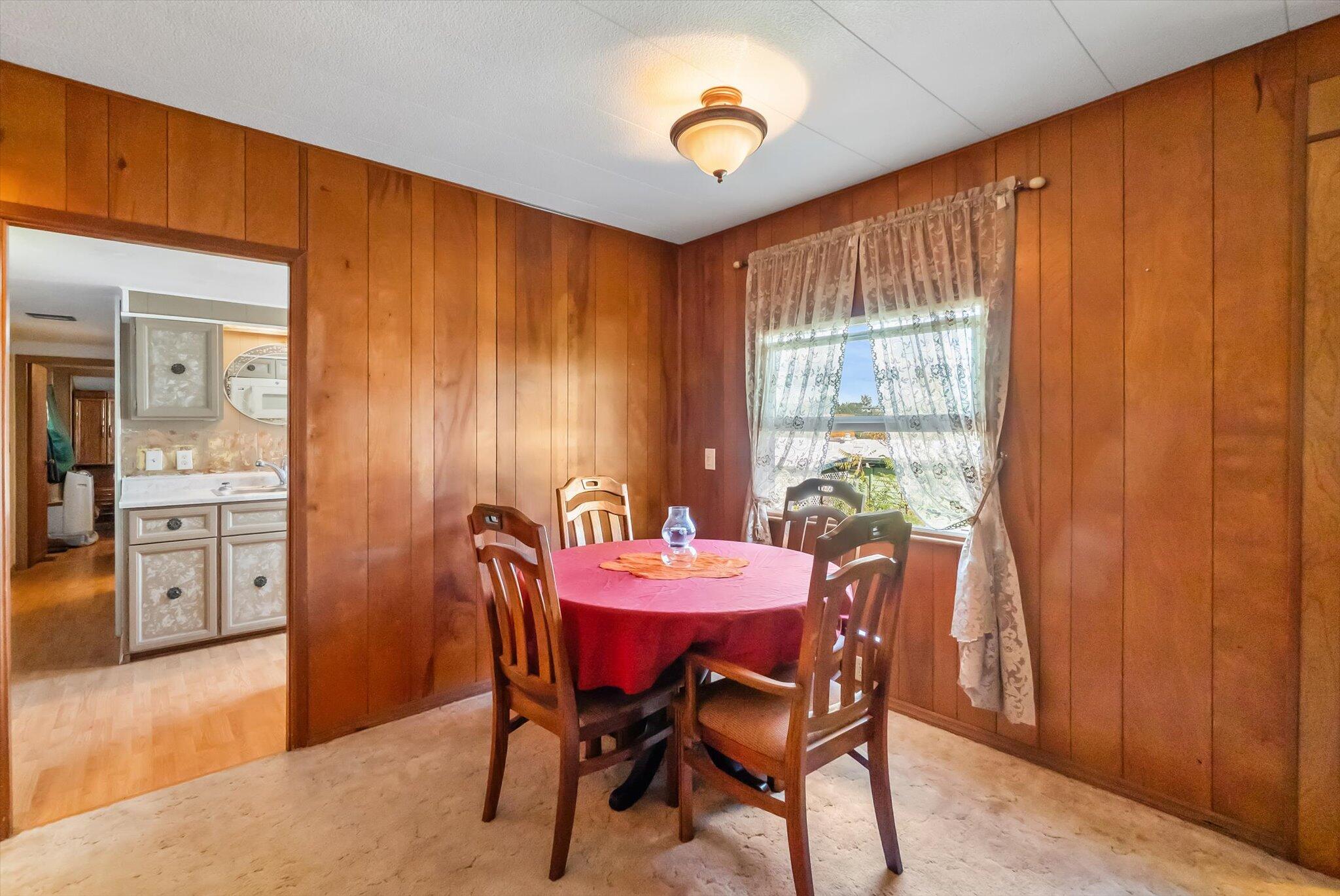 481 Twin View Boulevard, Unit 63 Redding, CA 96003 - Photo 7 of 20 a dining room with furniture and window