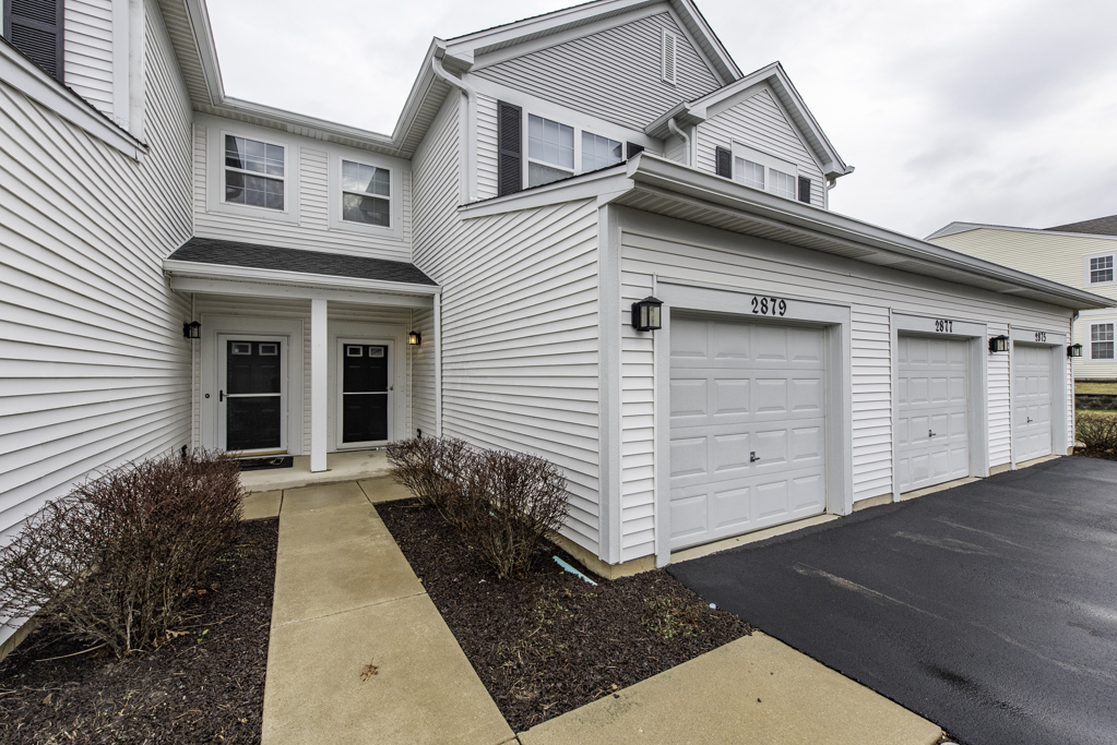 2879 Falling Waters Drive, Unit 2879 Lindenhurst, IL 60046 - Photo 30 of 30 a view of a house with a door