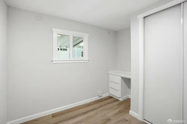 a view of an empty walk in closet