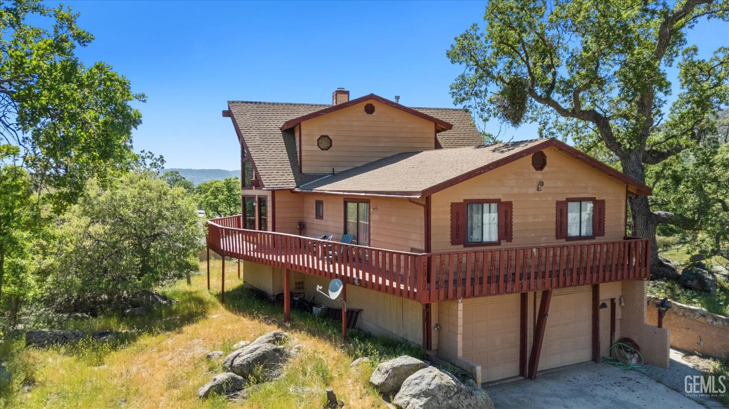 Undisclosed Address Tehachapi, CA 93561 - Photo 2 of 16 a view of a house with a yard balcony and furniture