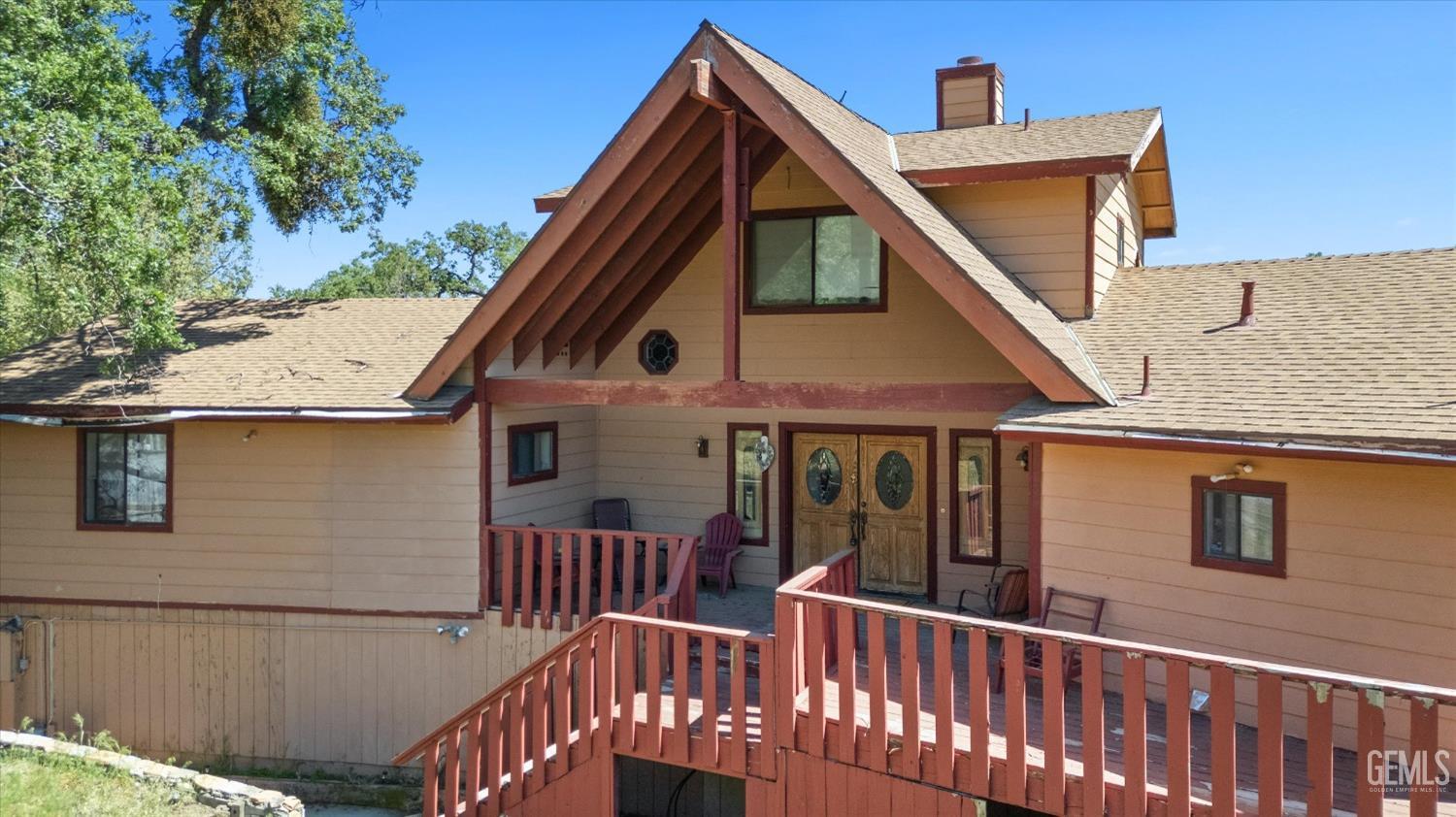 Undisclosed Address Tehachapi, CA 93561 - Photo 3 of 16 a view of house with a deck and furniture